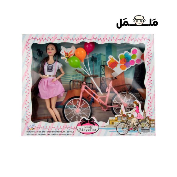 عروسک باربی همراه دوچرخه و بادکنک
